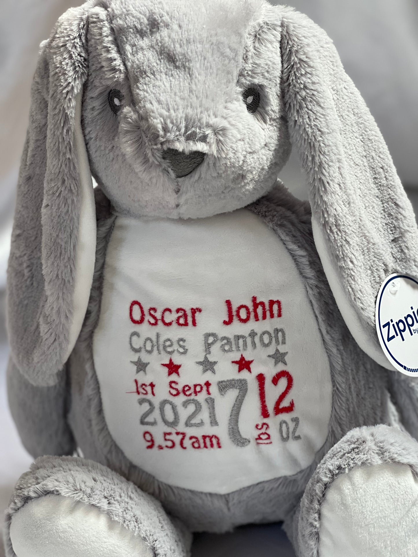 Personalised grey bunny teddy with embroidered birth details on tummy