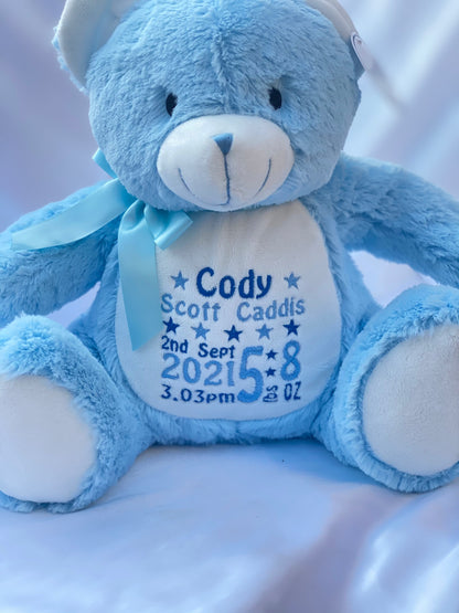 Personalised pastel blue teddy bear with embroidered name, featuring zipped bottom and removable inner pod for keepsakes or pyjamas