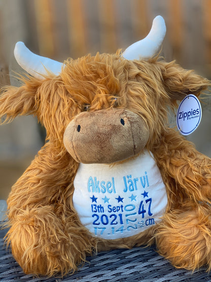 Soft plush highland cow toy with custom birth details