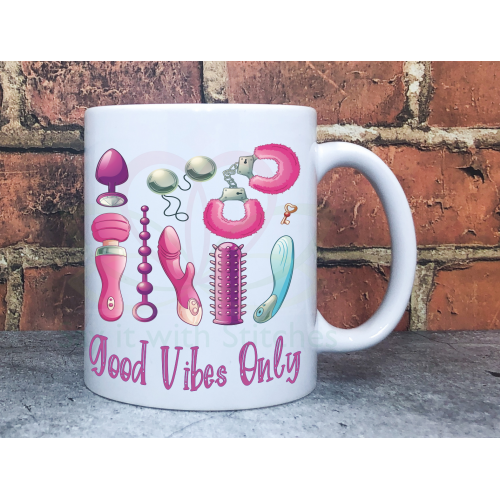 White ceramic mug with colourful rainbow-style “Good Vibes Only” text design – uplifting positive gift